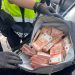 Agentes de la Policía Local de Valencia durante la incautación de 200.000 euros falsos en el Puente de Astilleros.