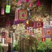 La Casa de la Dona transforma una calle de Torrent con un gran cielo de farolillos tejidos a mano